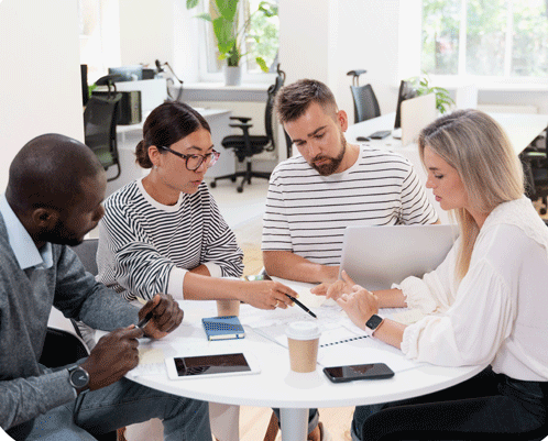 Group of people sitting around a table