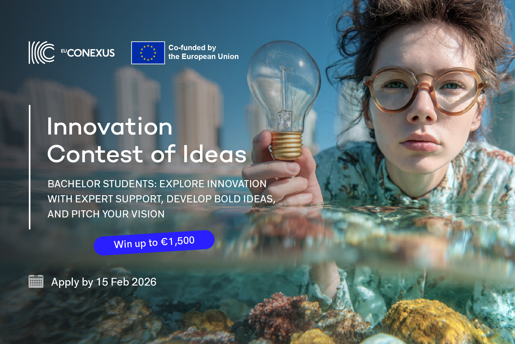 Student with glasses holding a lightbulb